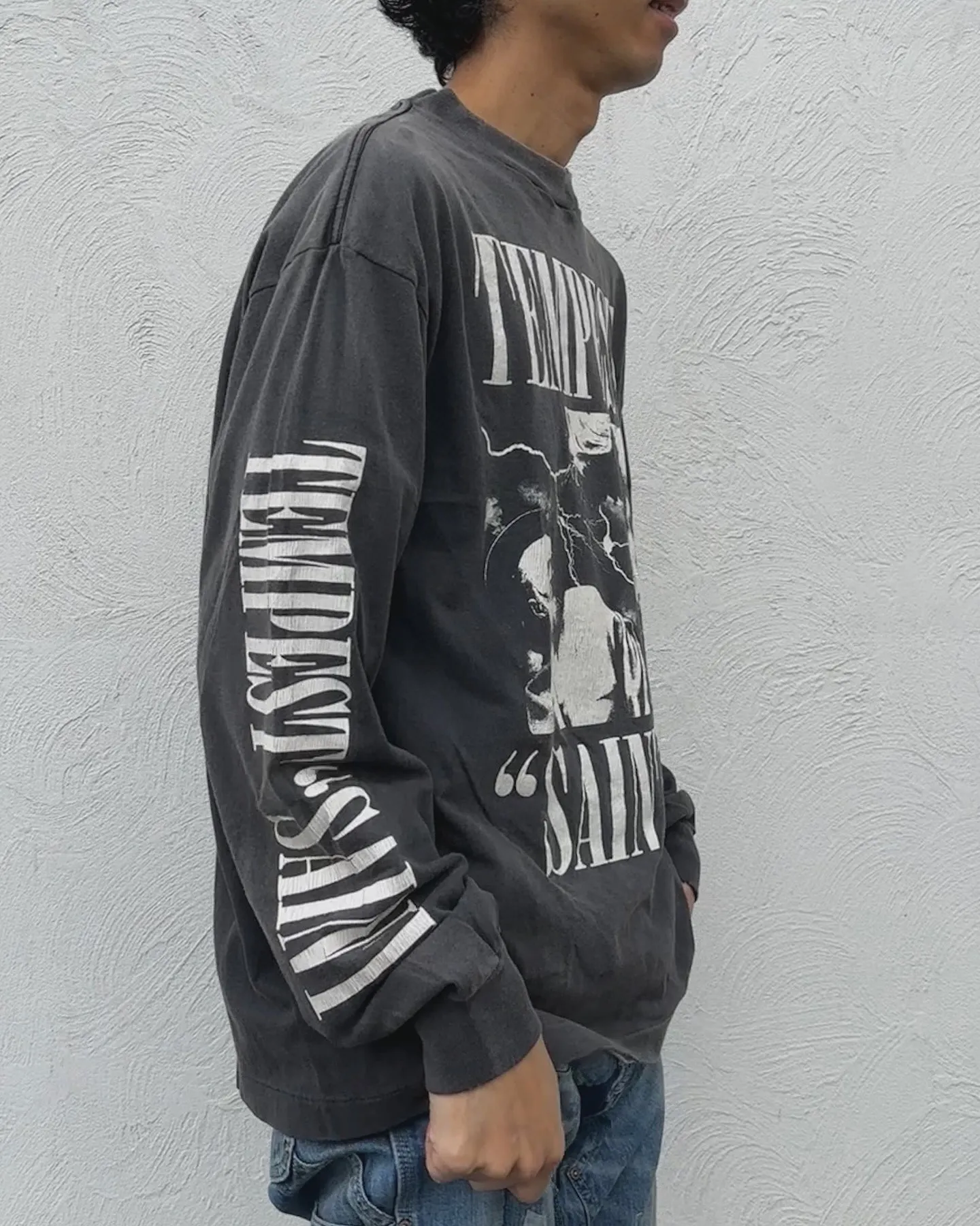 SAINT Mxxxxxx LS TEE/TEMPEST/BLK 'TEMPEST SAINT' Storm Religious Saints Cracked Retro Vulcanized Heavy Wash Long Sleeves Washed Black S-XL Assute Dyeing Multi-bit Horse Fading Craftsmanship Grinding and Hanging Holes Full of Old Feeling Top Printing Craftsmanship Purchasing Level